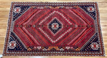 A vintage room size Oriental rug,