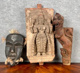 Three carved wooden collectibles,