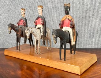 A vintage carving depicting three Kings