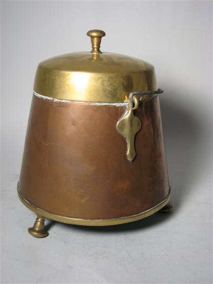 Copper and brass kettle on feet