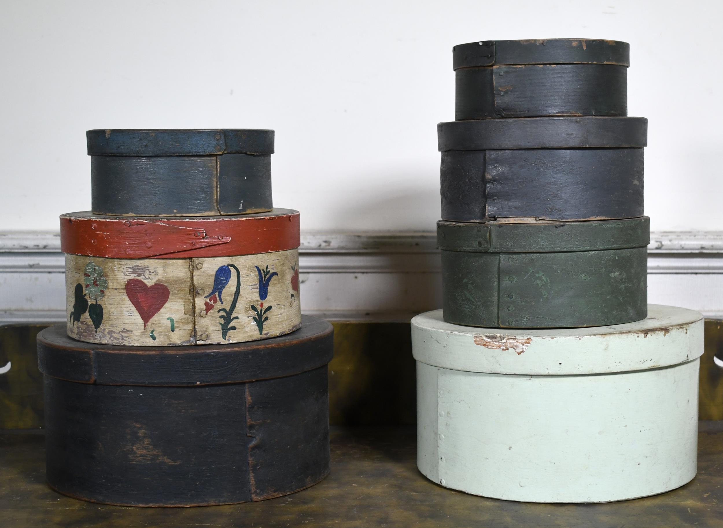 SEVEN ANTIQUE STACKING PANTRY BOXES.