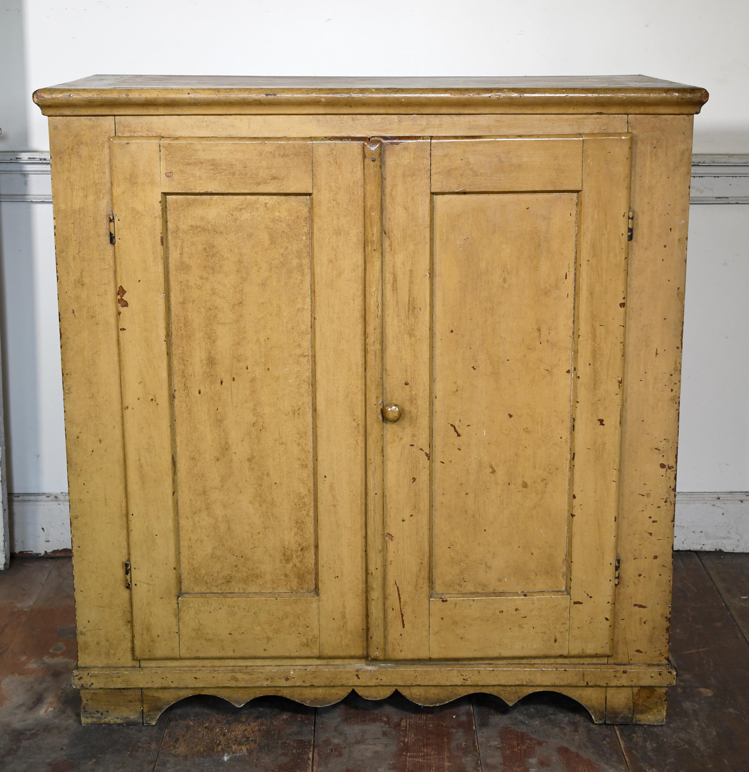 19TH C. MUSTARD PAINTED CUPBOARD.