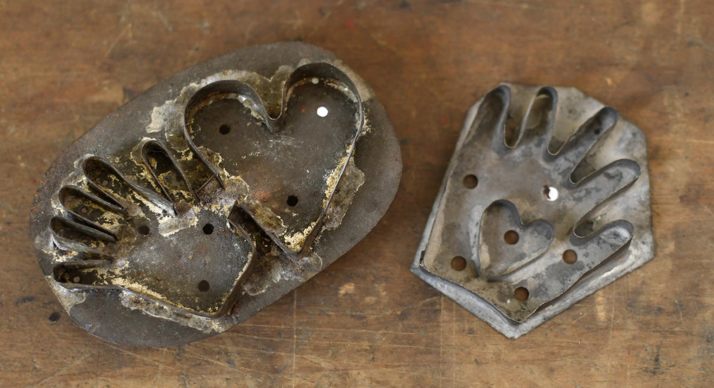 TWO HEART IN HAND TIN COOKIE CUTTERS.