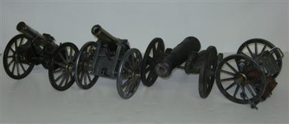 Two replica brass and base metal mortar