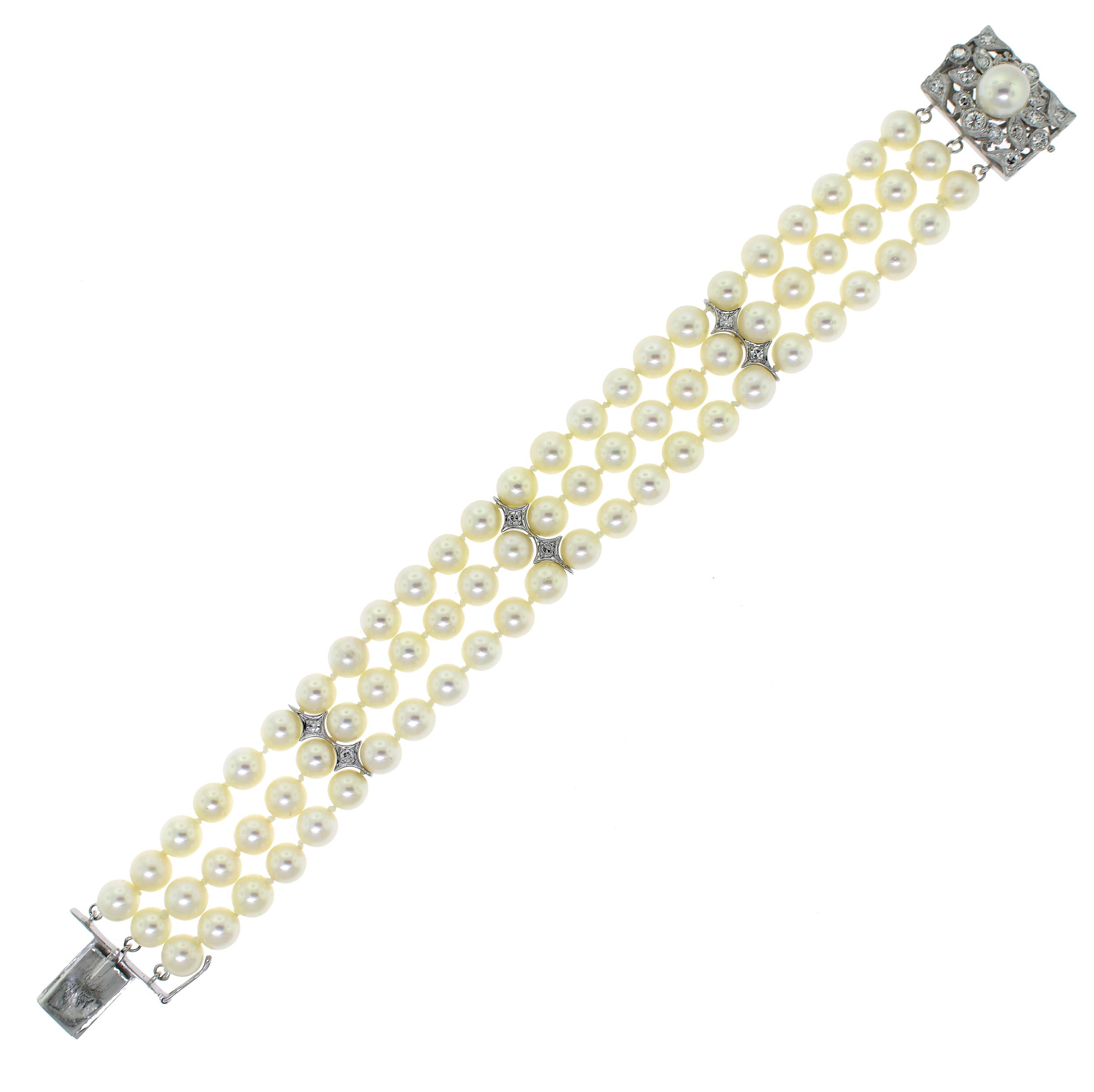 14K GOLD PEARL & DIAMOND BRACELET. A