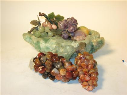 A Green quartz bowl with fruit