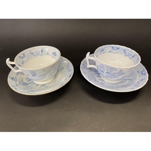 Two antique blue and white cups