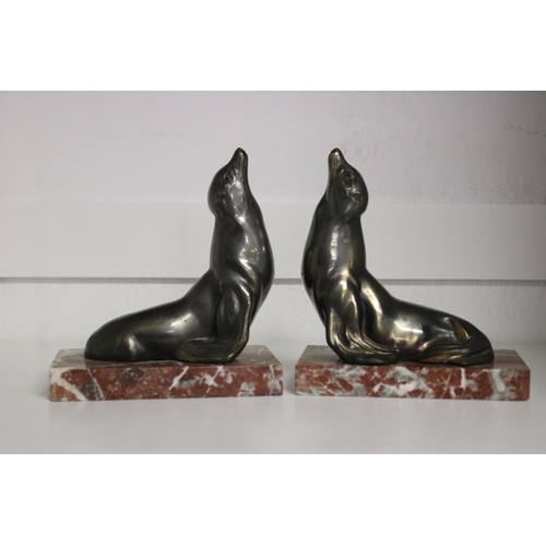 Pair of French Art Deco seal bookends,