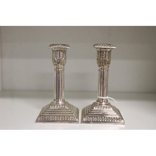 Pair of silver plate candlesticks,