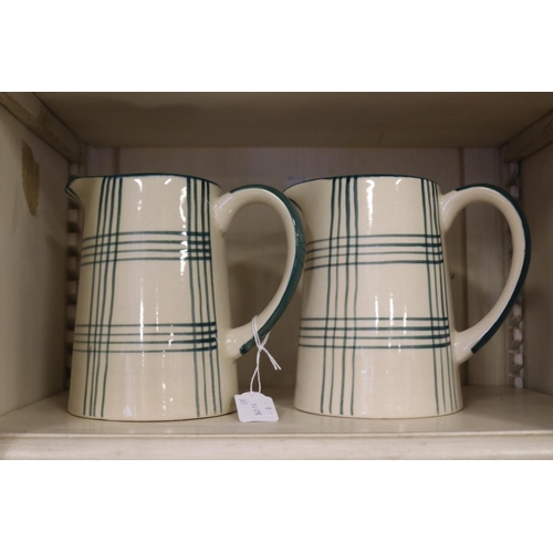 Pair of Country plaid pattern jugs,