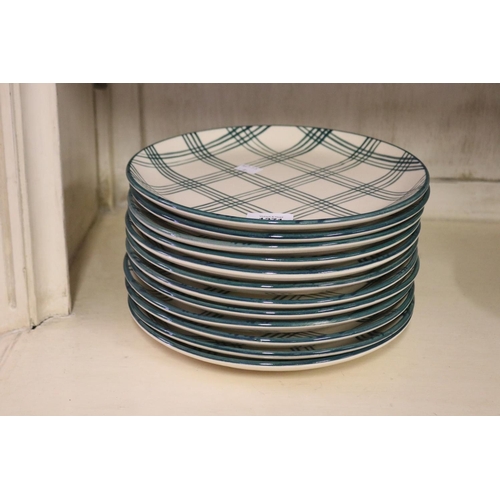 Set of twelve plaid pattern plates,