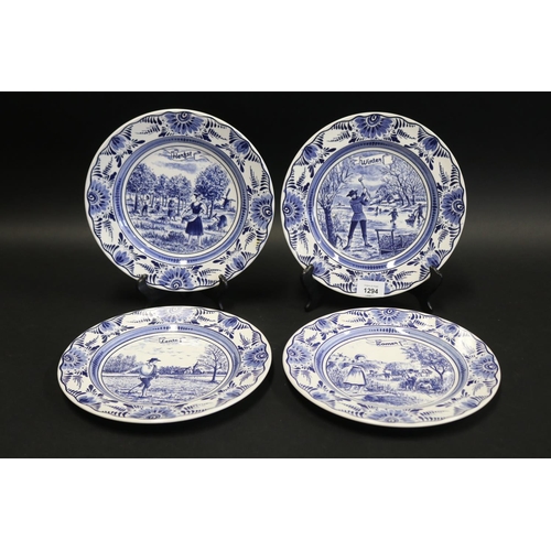 Set of four Delft four seasons plates,