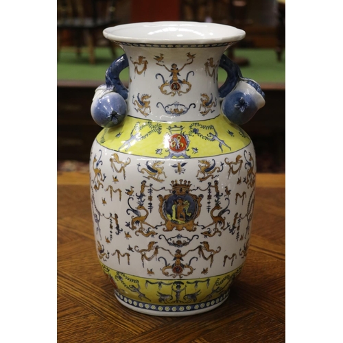 Decorative porcelain twin handled vase,