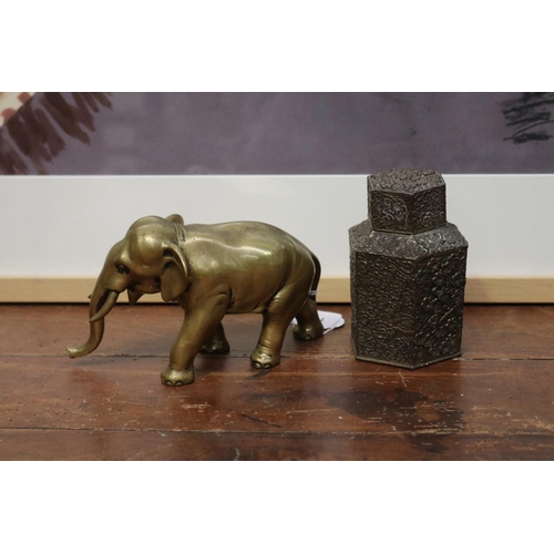 Antique polished bronze elephant along
