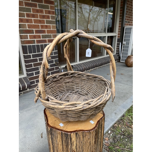 Unique woven branch basket, showing