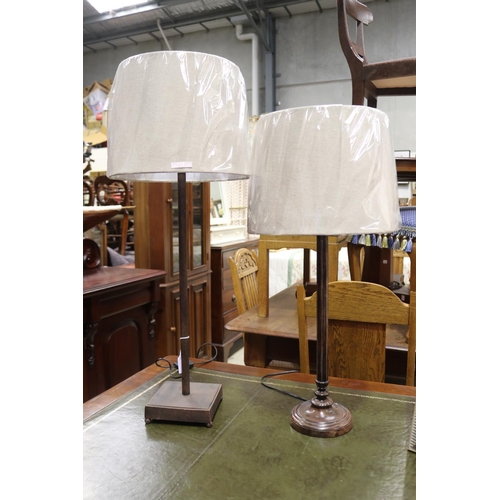 Two new bronzed metal lamps, approx