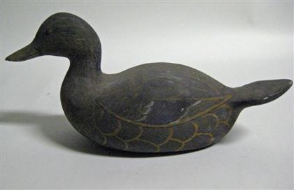 Carved and painted black duck decoy