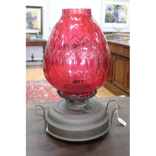 Large cranberry glass oil lamp,
