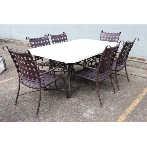 Faux stone garden table and six chairs,