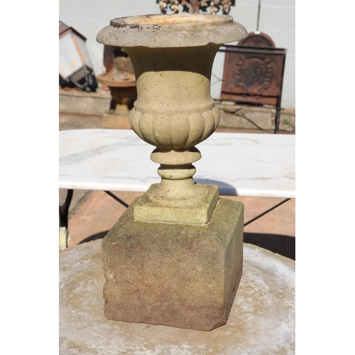 Antique marble urn, mounted to stone