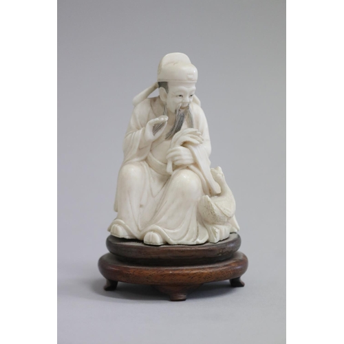 Chinese carved ivory figure of a man