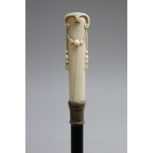 Walking stick, with well carved ivory