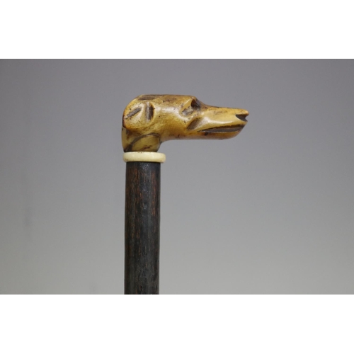 Walking stick, with carved bone dog