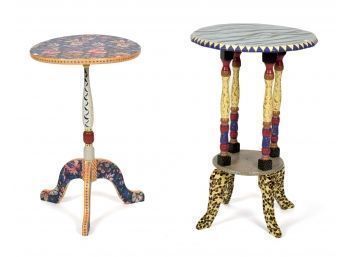 Two colorfully painted candlestands,