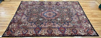 A vintage room size Oriental rug 305f92