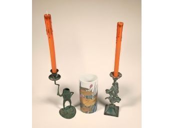 Two bronze candle stick holders  30600a
