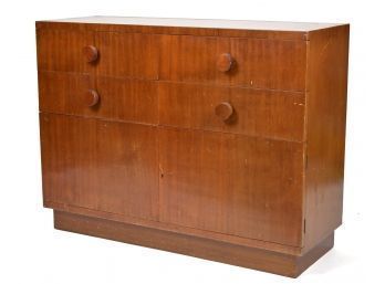A vintage Deco style mahogany veneered