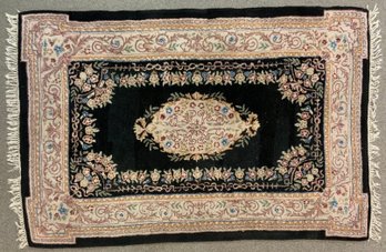 An oriental rug with pink central 306039