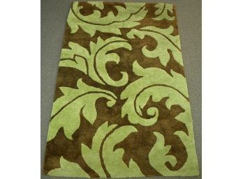 A contemporary area rug with brown 306052