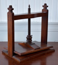 An antique English mahogany book press,