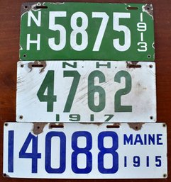 Three antique porcelain license plates,