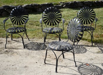 A set of four vintage black painted