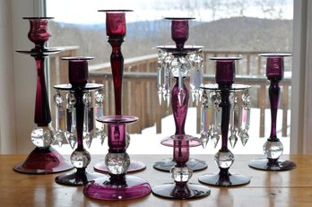 Eight vintage amethyst glass candlesticks 3061a2