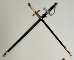 Two vintage fraternal order swords with
