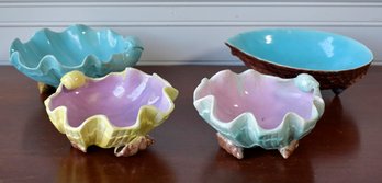 Group of four majolica open shell