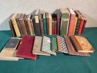 Over 30 antique books, including: