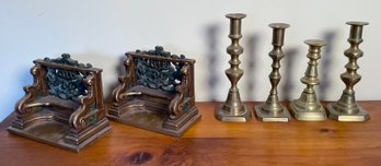 Four antique brass candlesticks,
