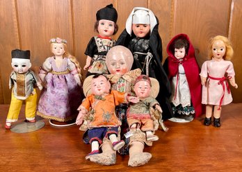 Nine world dolls including: nun