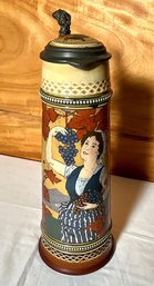 A Mettlach stein depicting woman