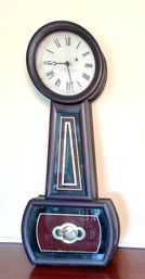 A 19th C banjo clock with a grain 306802