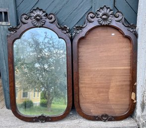 A rare pair of antique carved mahogany