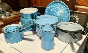 Twelve pieces of vintage blue enamel