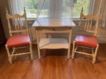 Two vintage white painted chairs