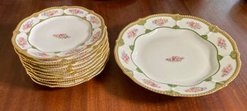 A set of nine Limoges plates with 306971