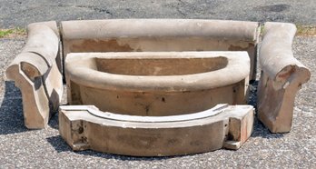 A vintage concrete “D” form