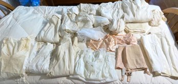 A large lot of antique and vintage garments